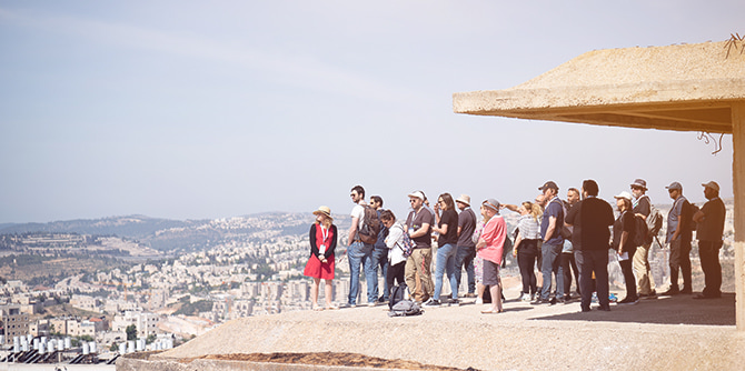 Fellows looking out from Tell El-Ful (Photo: Simanim Productions)