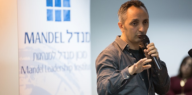 David Deri speaks about his documentary film about Mizrahi immigrants at a Mandel Platform (Bimat Mandel)event